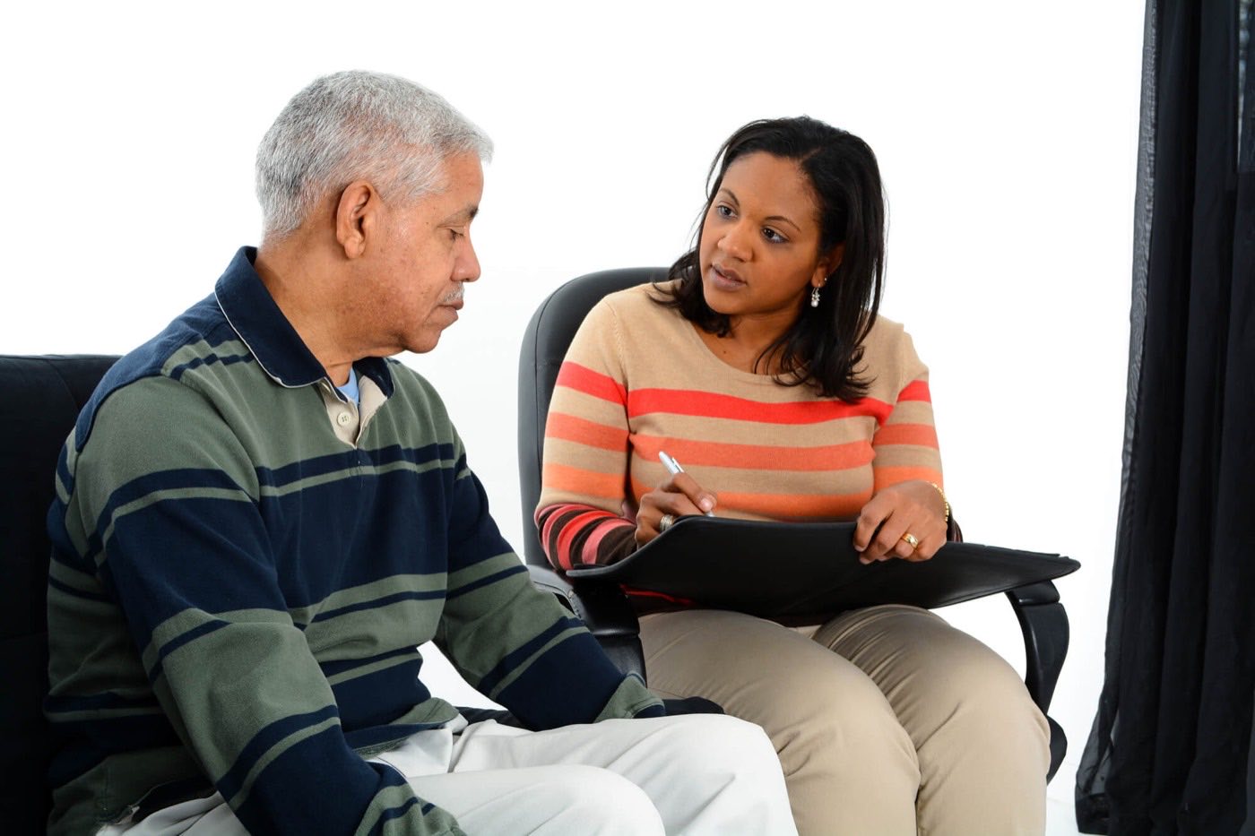 A VocMed vocational counselor meeting one-on-one with a client.